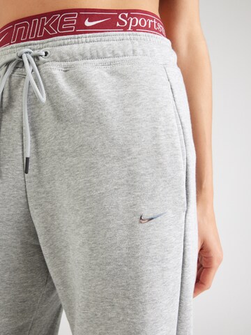 Nike Sportswear Zvonové kalhoty Kalhoty 'PHNX FLC' – šedá