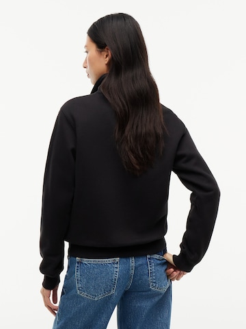 Tommy Jeans - Sudadera en negro
