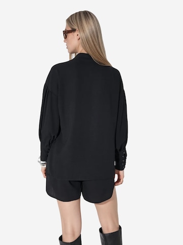 Pantalons de tailleur MSN Collection en noir