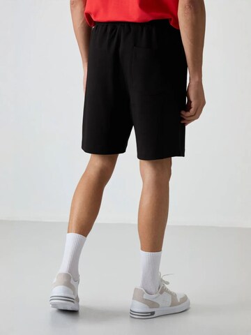 Regular Pantalon Tommy Life en noir