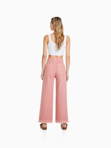 Bershka Szeroka nogawka Spodnie w kolorze różowy