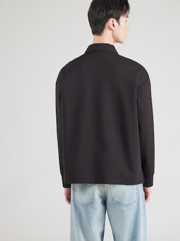Calvin Klein - Camiseta en negro: atrás