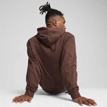 PUMA Sportsweatshirt in Braun