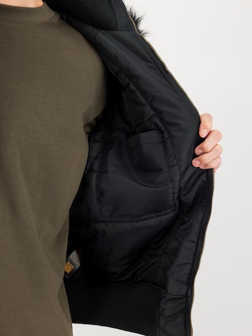 ALPHA INDUSTRIES Between-Season Jacket 'Deflector' in Black: side