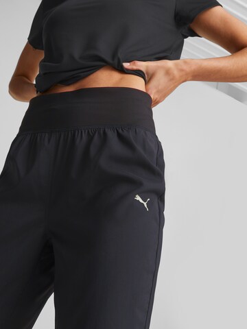 PUMA Tapered Sportbroek in Zwart