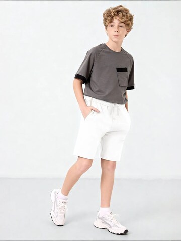 Tommy Life tavaline Püksid 'TOMMY Jugend-Shorts Aus Baumwollmischung', värv pruun