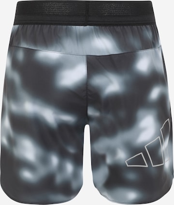 Regular Pantaloni sport 'Run Icons Logo Graphic Aop' de la ADIDAS SPORTSWEAR pe negru