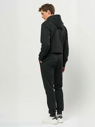 U.S. POLO ASSN. Regular Pants ' UMDion ' in Black