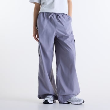 Pantaloni di new balance in lilla: frontale
