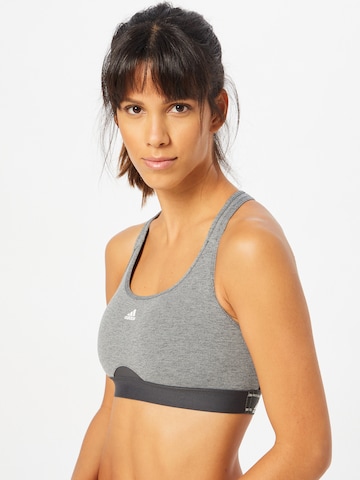 ADIDAS PERFORMANCE Bustier Urheilurintaliivit 'Powerreact Medium-Support' värissä harmaa: edessä