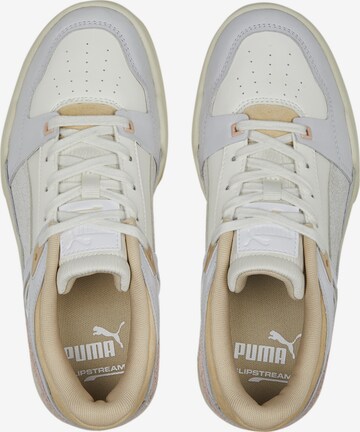 Baskets basses 'Slipstream Thrifted' PUMA en blanc