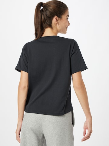 UNDER ARMOUR Funkční tričko 'Glow' – černá