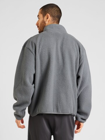 Veste en polaire 'CLUB' Nike Sportswear en gris