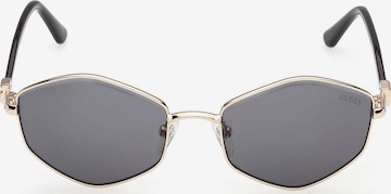 Lunettes de soleil GUESS en or : devant