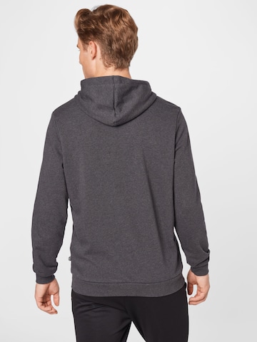 PUMA - Sweatshirt de desporto 'Ess' em cinzento