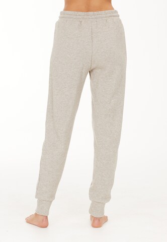 Athlecia Regular Workout Pants 'Asinie' in Beige