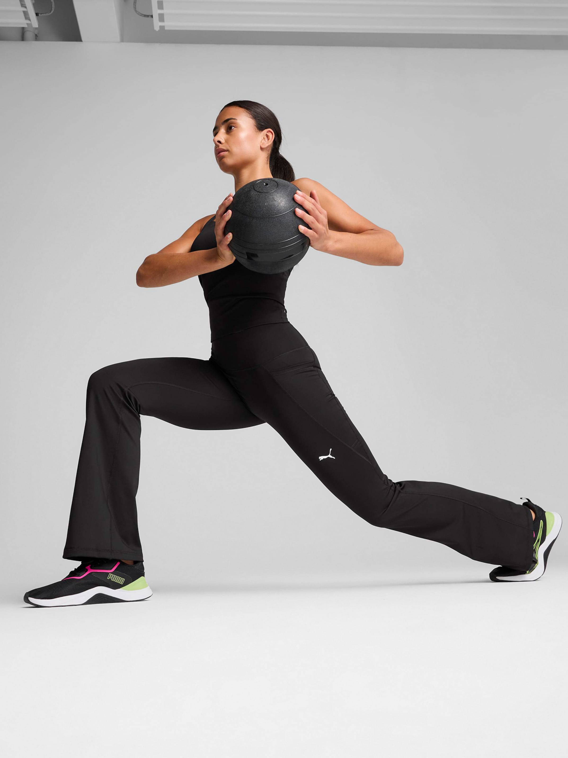 PUMA Boot cut Workout Pants 'Tad Essentials' in Black