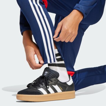 ADIDAS PERFORMANCE - Tapered Calças de desporto 'Tiro 25 Essentials' em azul