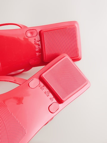 Tongs Next en rouge