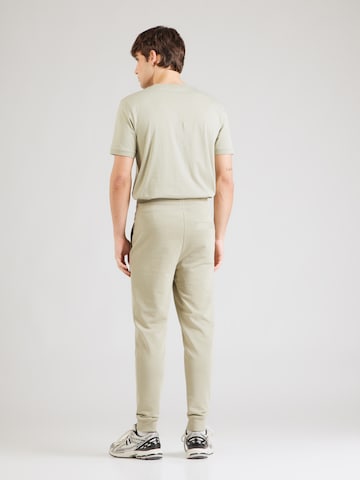 HUGO Tapered Παντελόνι 'Doak212' σε πράσινο