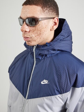 Nike Sportswear Přechodná bunda – modrá