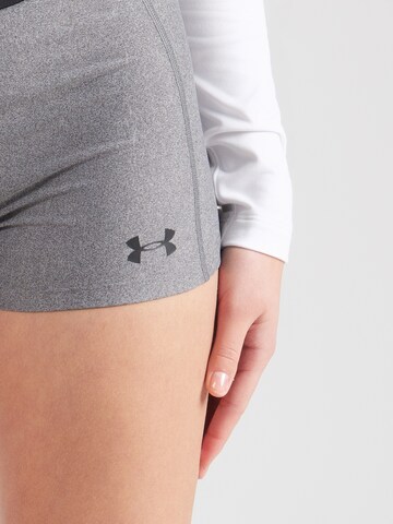 Skinny Pantalon de sport UNDER ARMOUR en noir