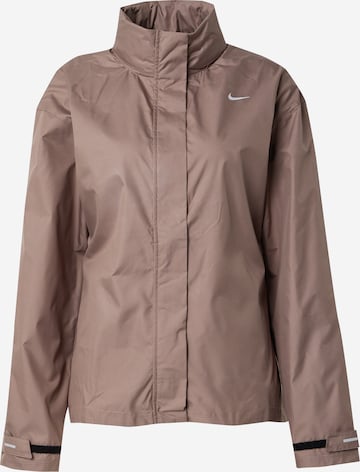 NIKE Spordijope 'FAST', värv pruun: eest vaates