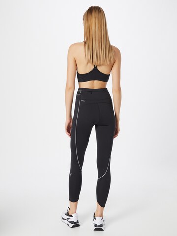 PUMA Skinny Sportbroek in Zwart