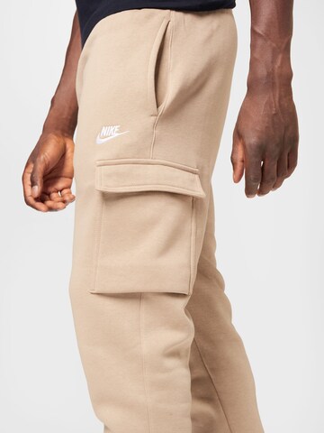 Nike Sportswear Tapered Cargo trousers in Beige