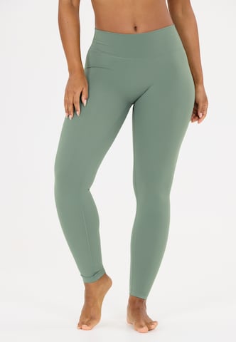 Athlecia Skinny Sports trousers 'Emarri' in Green