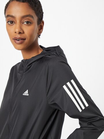 ADIDAS SPORTSWEAR Sports jacket 'Own The Run ' in Black