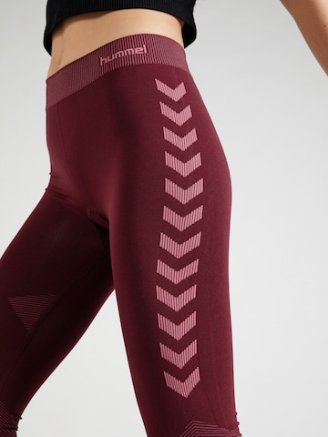 Skinny Pantalon de sport 'First' Hummel en rouge