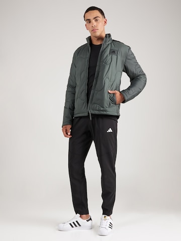 ADIDAS SPORTSWEAR Αθλητικό μπουφάν 'Nuganic Light Insulation' σε πράσινο