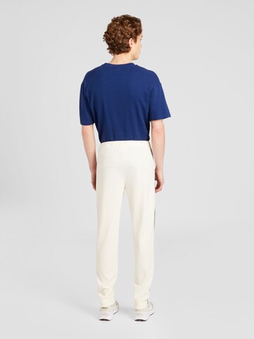 Tapered Pantaloni sportivi 'New Damarindo' di Sergio Tacchini in beige