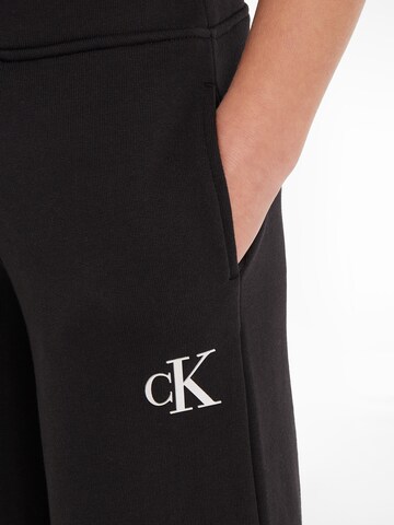 Calvin Klein Jeans Wide Leg Hose in Schwarz