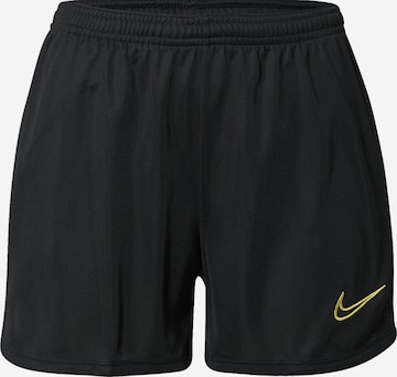 NIKE Sports trousers in Black: front