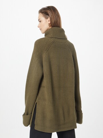 NA-KD Širok pulover | zelena barva
