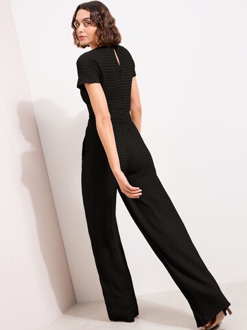 Friends Like These Jumpsuit in Schwarz