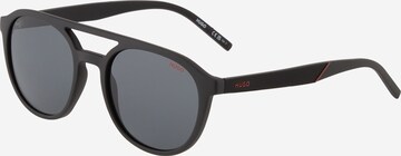 Lunettes de soleil HUGO en noir : devant