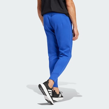 ADIDAS SPORTSWEAR Tapered Workout Pants 'Z.N.E. Premium' in Blue