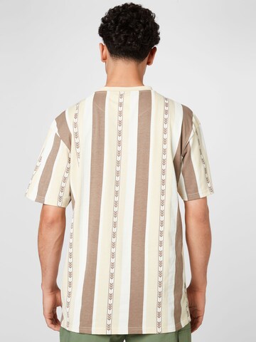 Maglietta di Karl Kani in beige