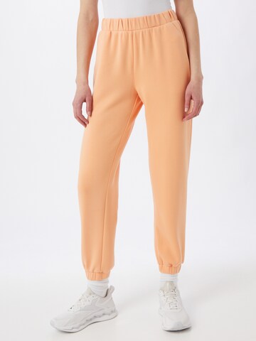 MSCH COPENHAGEN - Tapered Pantalón en naranja: frente