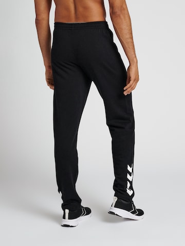 Regular Pantalon de sport 'Core XK' Hummel en noir