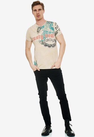 Rusty Neal T-Shirt mit zeitlosem Print in Beige