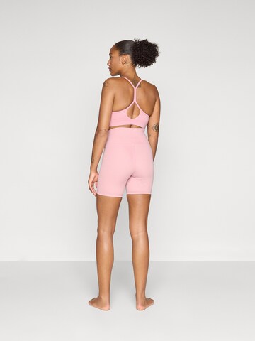 Skinny Pantalon de sport new balance en rose