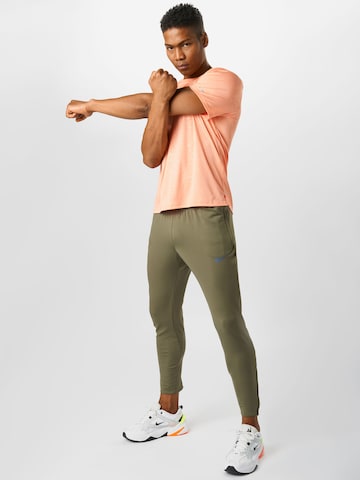 NIKE - Slimfit Pantalón deportivo en verde