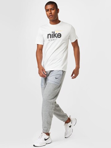 NIKE - Camisa funcionais 'WILD CLASH' em branco