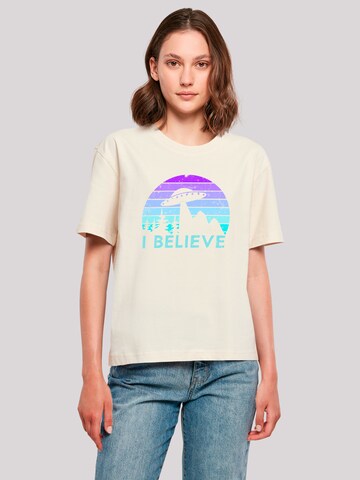 T-shirt 'I BELIEVE UFO Alien Raumschiff Retro' F4NT4STIC en beige : devant