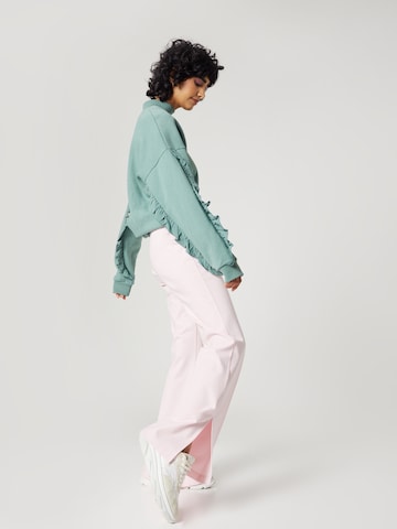 florence by mills exclusive for ABOUT YOU Bootcut Spodnie 'Tela' w kolorze różowy