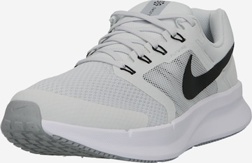 NIKE Sports shoe in Grey: front
